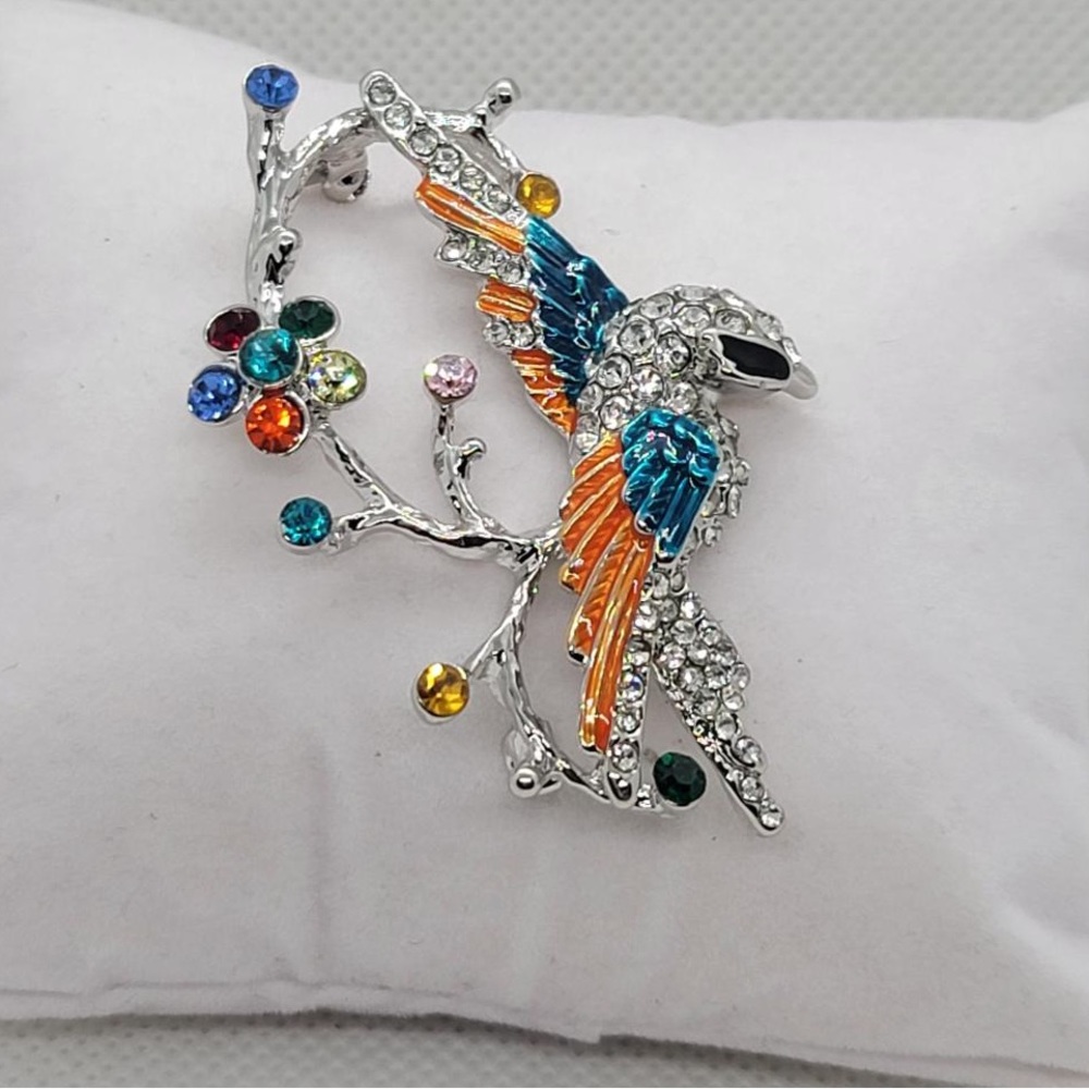 Silver based bird brooch with crystals